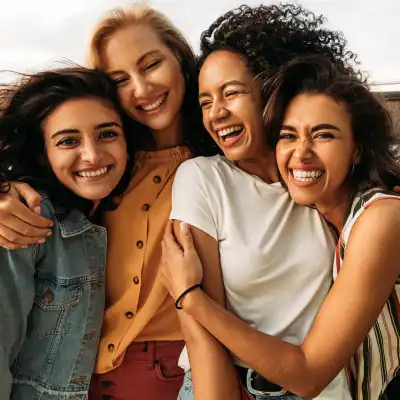 Girls smiling while looking at the camera